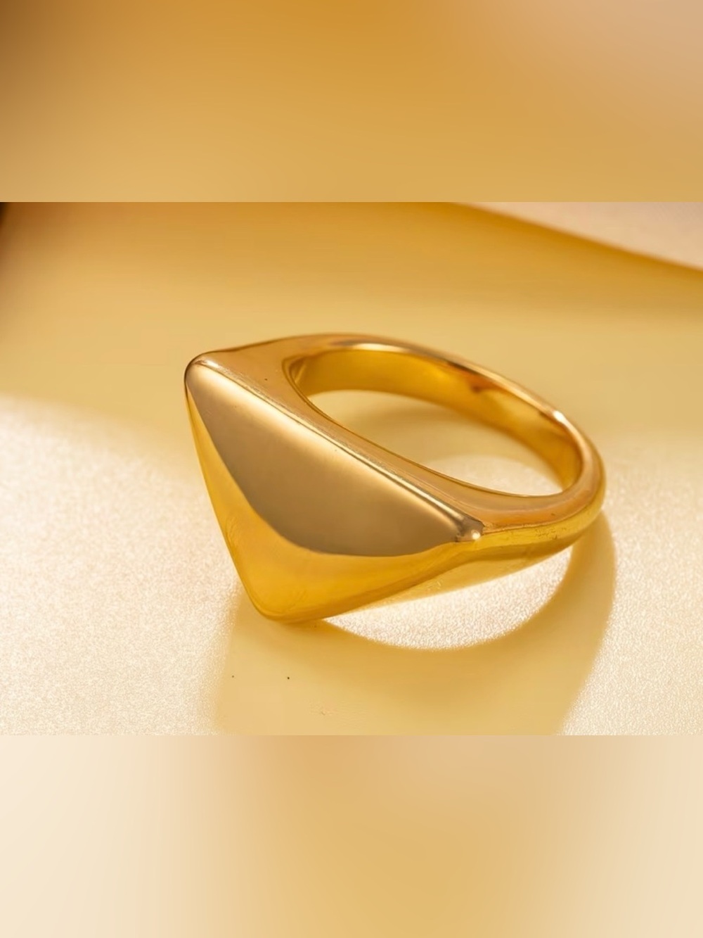 Sleek Gold Statement Ring - Polished Metal Band